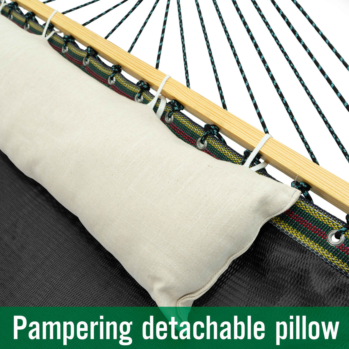 Beige detachable hammock pillow next to dark fabric and multicolor rope ties