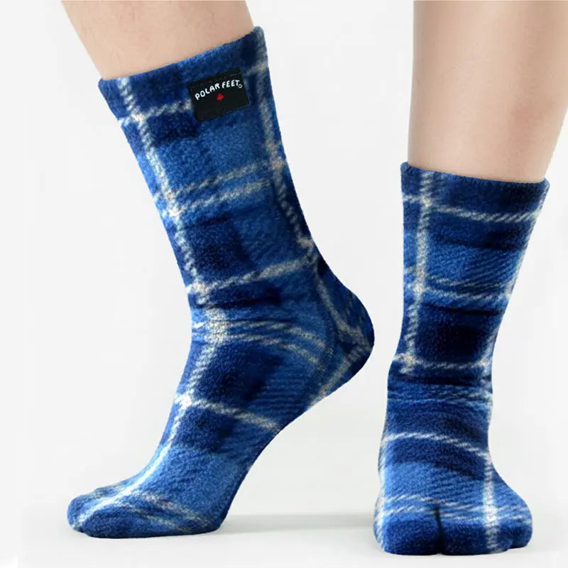 Blue plaid tabi fleece socks on feet, with separated toes and comfort cuffs