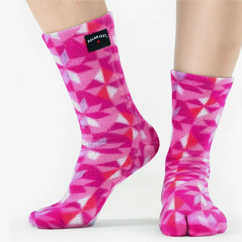 Fleece tabi socks in magenta and pink geometric pattern with Polar Feet tag and two toes
