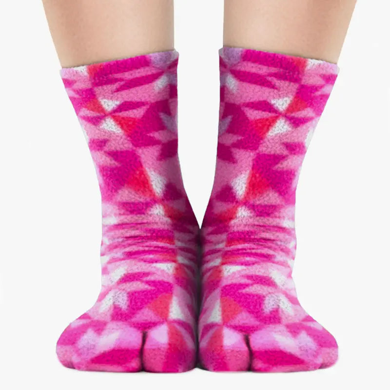 Magenta and pink geometric tabi socks with two-toe split and ribbed cuffs