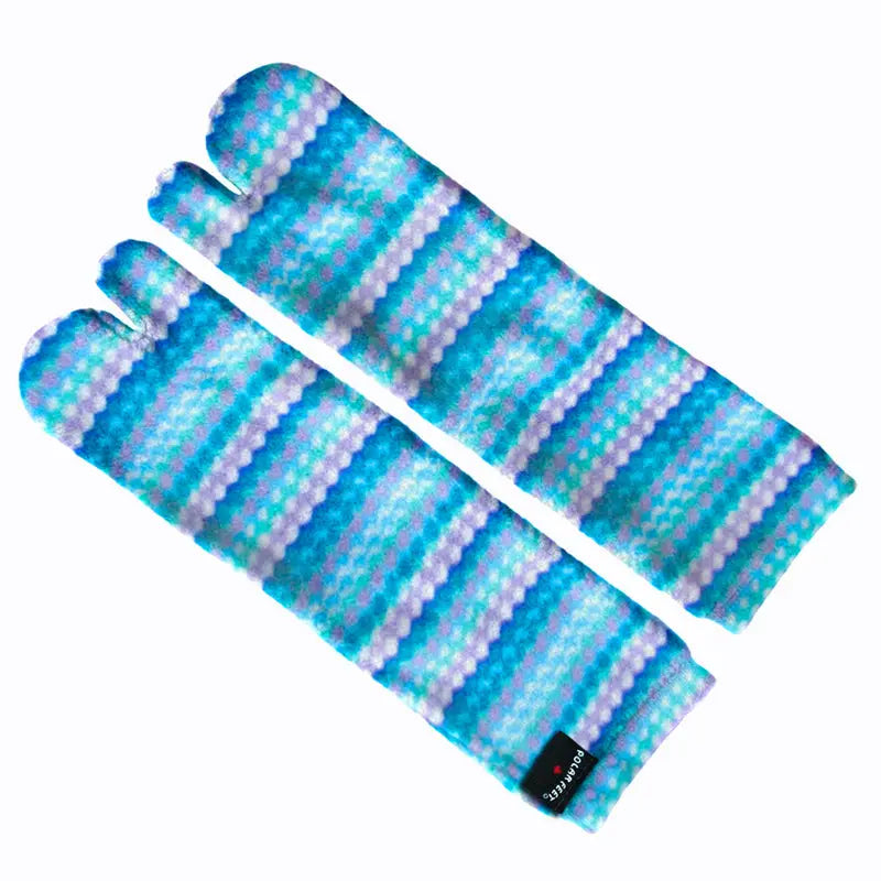 Fleece tabi sock pair laid flat, teal and purple ripple stripes with tag