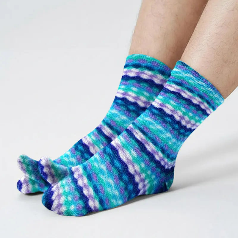 Fleece tabi socks in teal, purple, and blue ripple stripe pattern