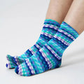 Fleece tabi socks in teal, purple, and blue ripple stripe pattern