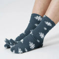 Fleece tabi socks in dark gray with white snowflake pattern and split toe