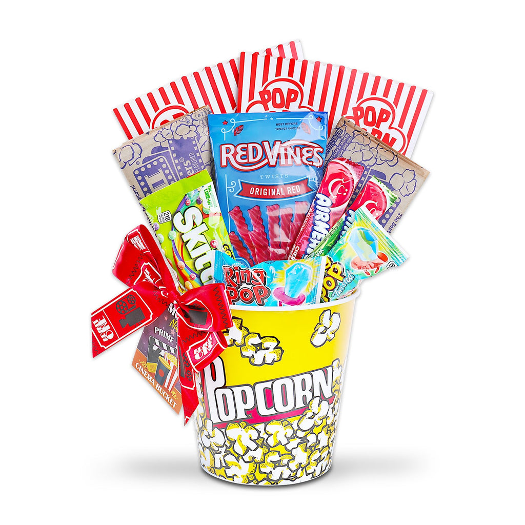 Popcorn gift basket wrapped with red-striped toppers and assorted snack packets.