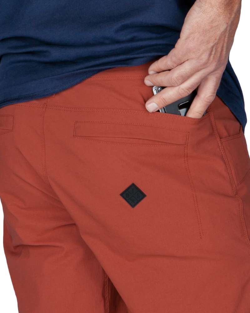 Men's field shorts 2.0, rust-red with zip fly and small logo patch.