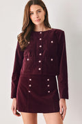 Burgundy velvet cropped jacket with jeweled button front and patch pockets