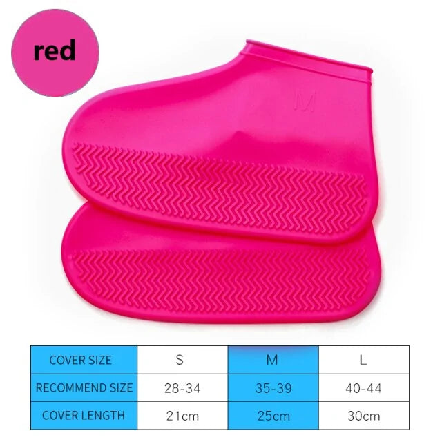 Red silicone shoe cover boots, stacked pair with textured zigzag grip tread