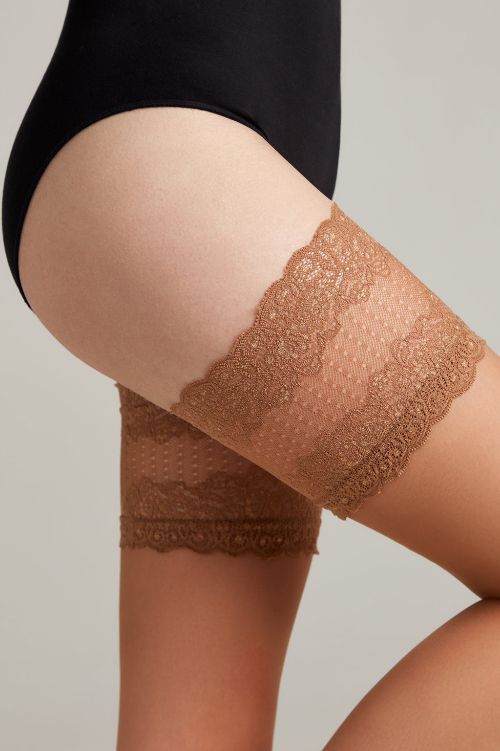 Bronze tan lace top band on sheer stockings