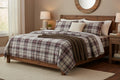 Plaid full bed sheet set with matching pillowcases in gray, blue, and red tartan