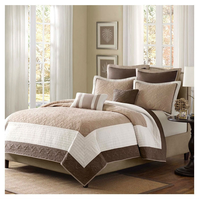 Quilt and coverlet set with beige, tan, and brown geometric block pattern