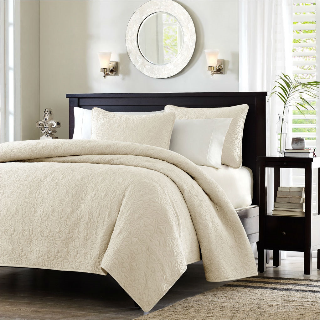 Ivory beige quilt coverlet set with two matching decorative shams, bed-ready