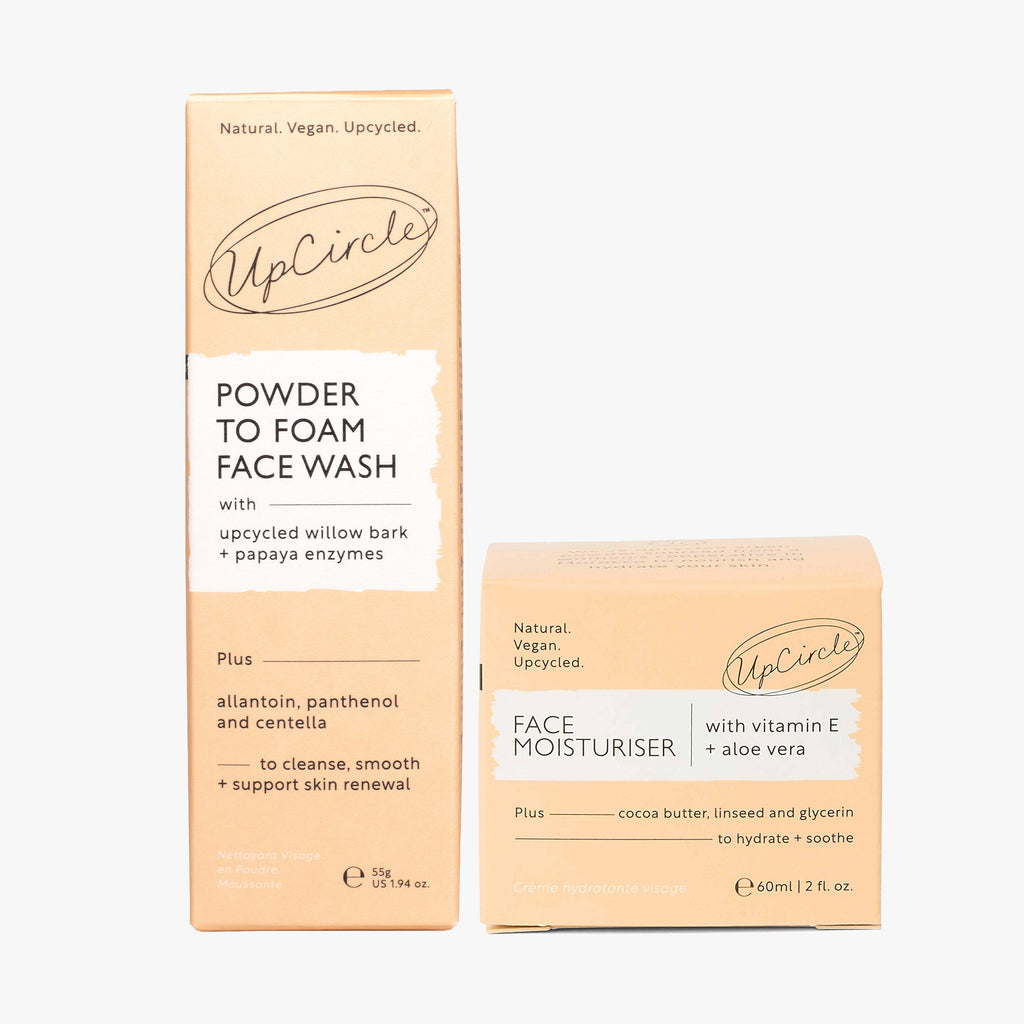 UpCircle powder-to-foam face wash and face moisturiser packaging with back labels