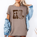 Brown cowboy boots graphic T-shirt with front boot and leaf print
