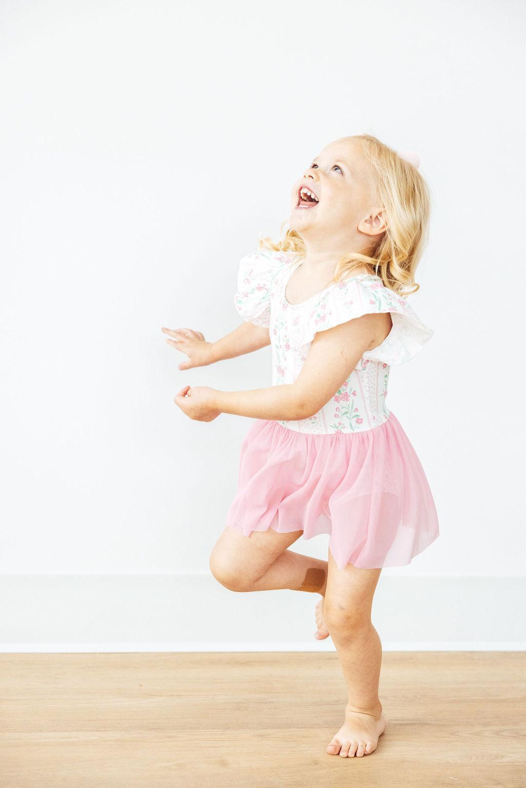 Girls floral twirl leotard with pink tulle skirt and ruffle sleeves