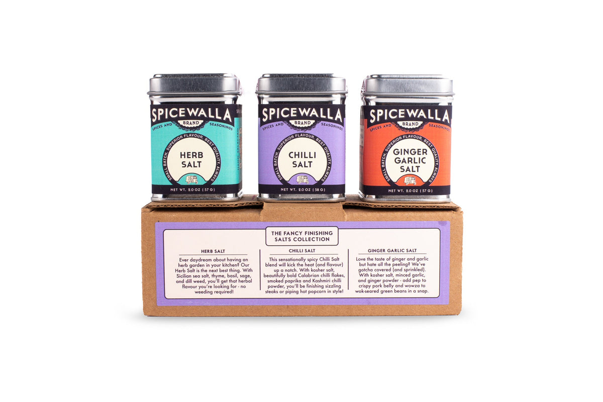 Spicewalla 3-pack finishing salts set with three labeled tins on cardboard base