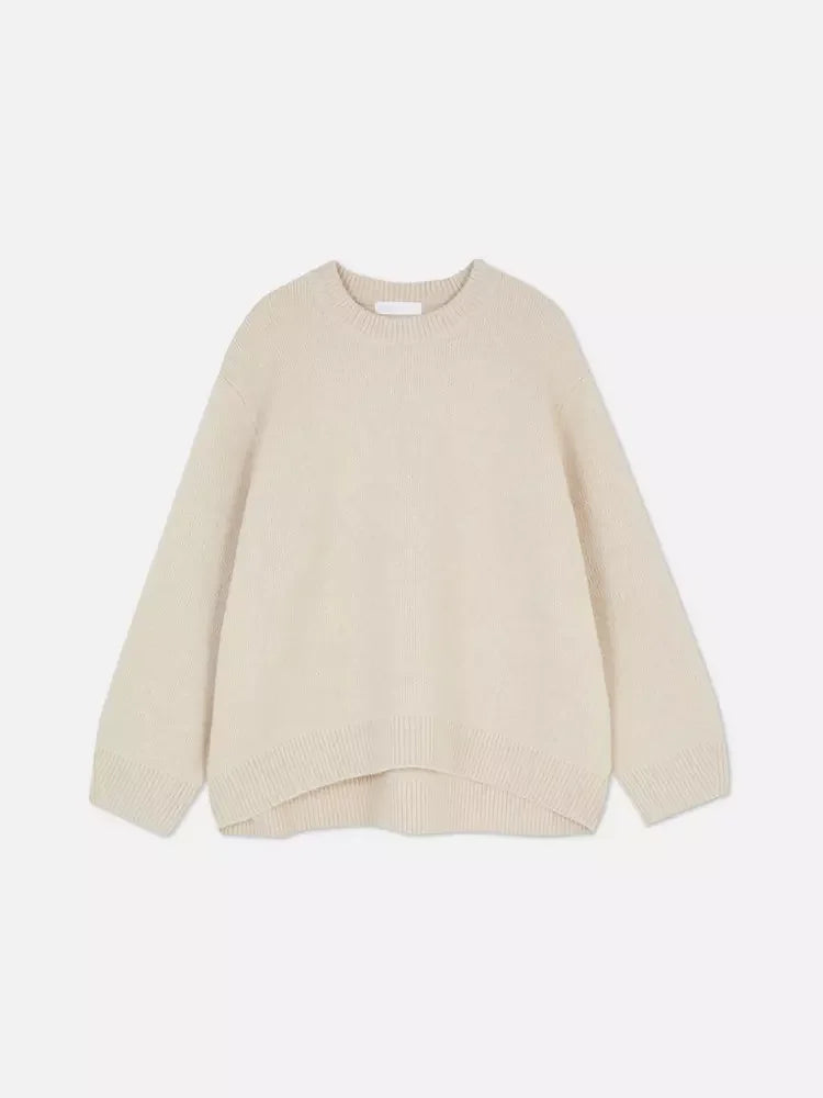 Beige knit sweater with crew neck and long sleeves