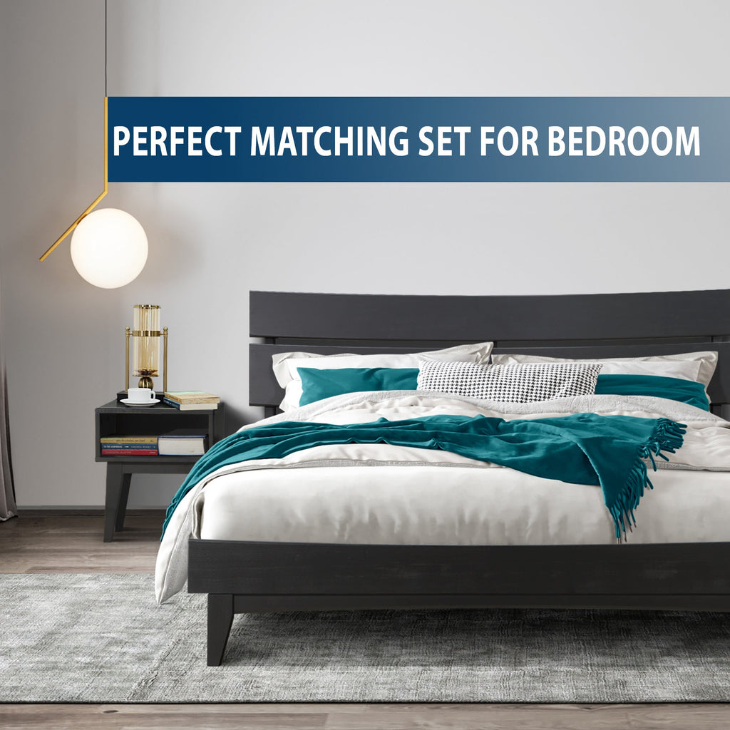 Black solid wood bed frame with matching nightstand and teal bedding