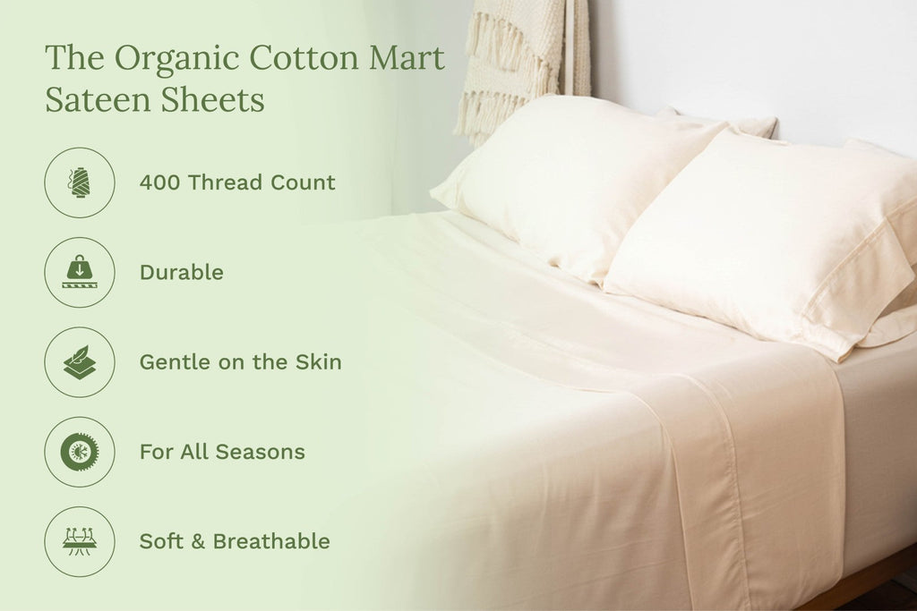 Light cream sateen bed sheets set on a bed, draped over mattress and pillows