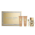 Michael Kors Femme perfume gift set with box, two lotions, and two fragrance bottles