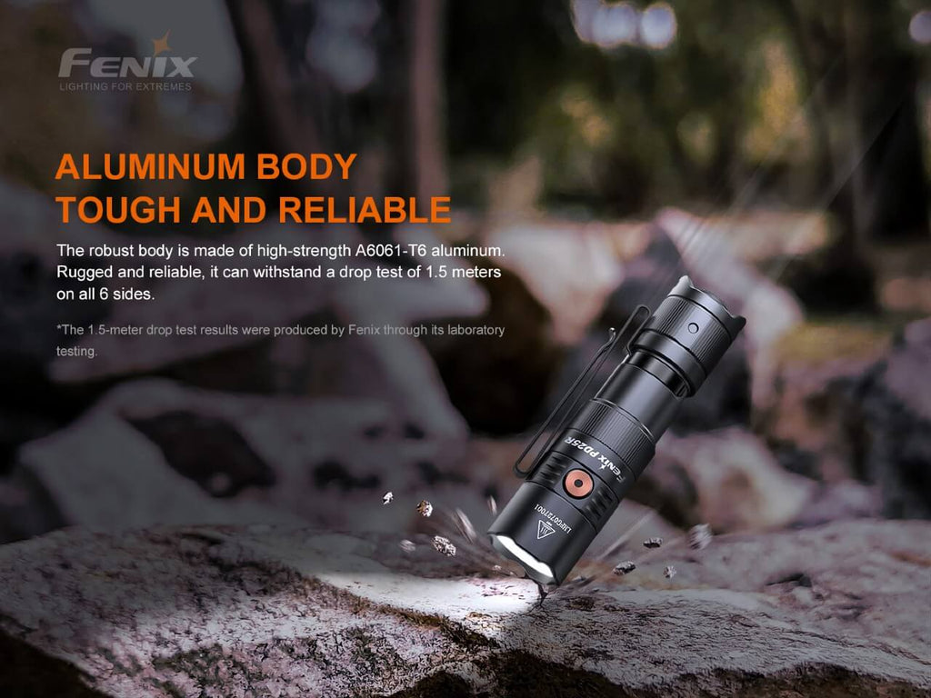 Black rechargeable LED flashlight with textured grip and orange-ring bezel.