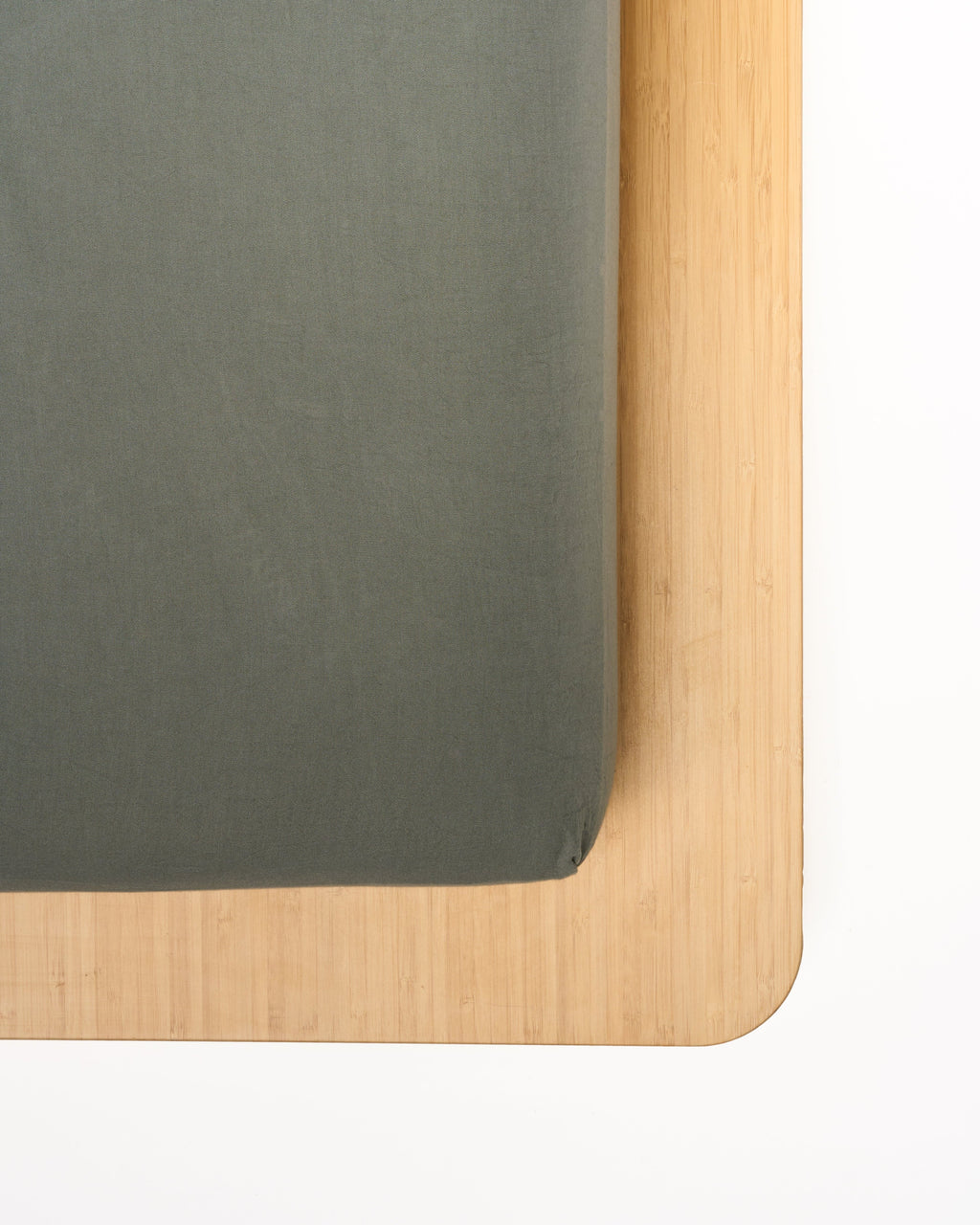 Milk fibre sheet set fitted sheet corner, dark green with smooth finish