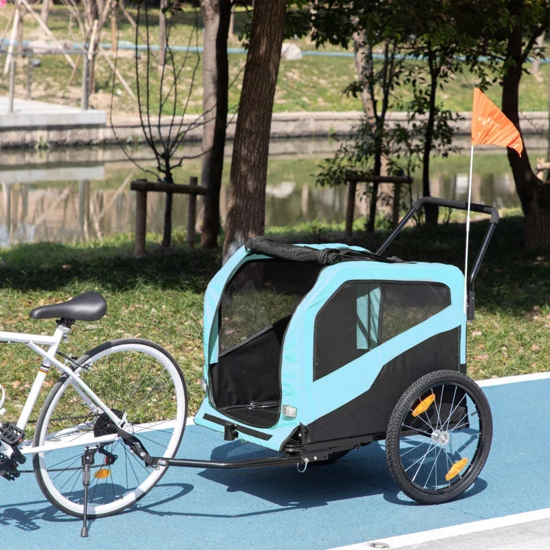 Blue dog trailer stroller with push handlebar and enclosed mesh cabin on wheels