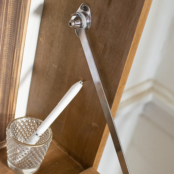 Stainless hinge and support rod on fold-down wood shelf for holding open position