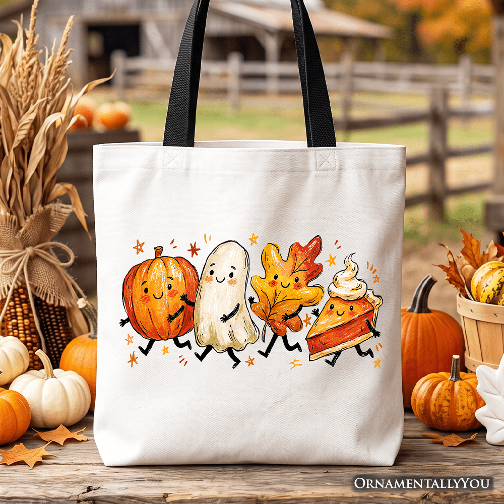 White canvas tote bag with black handles, featuring cute pumpkin, ghost, leaf and pie print