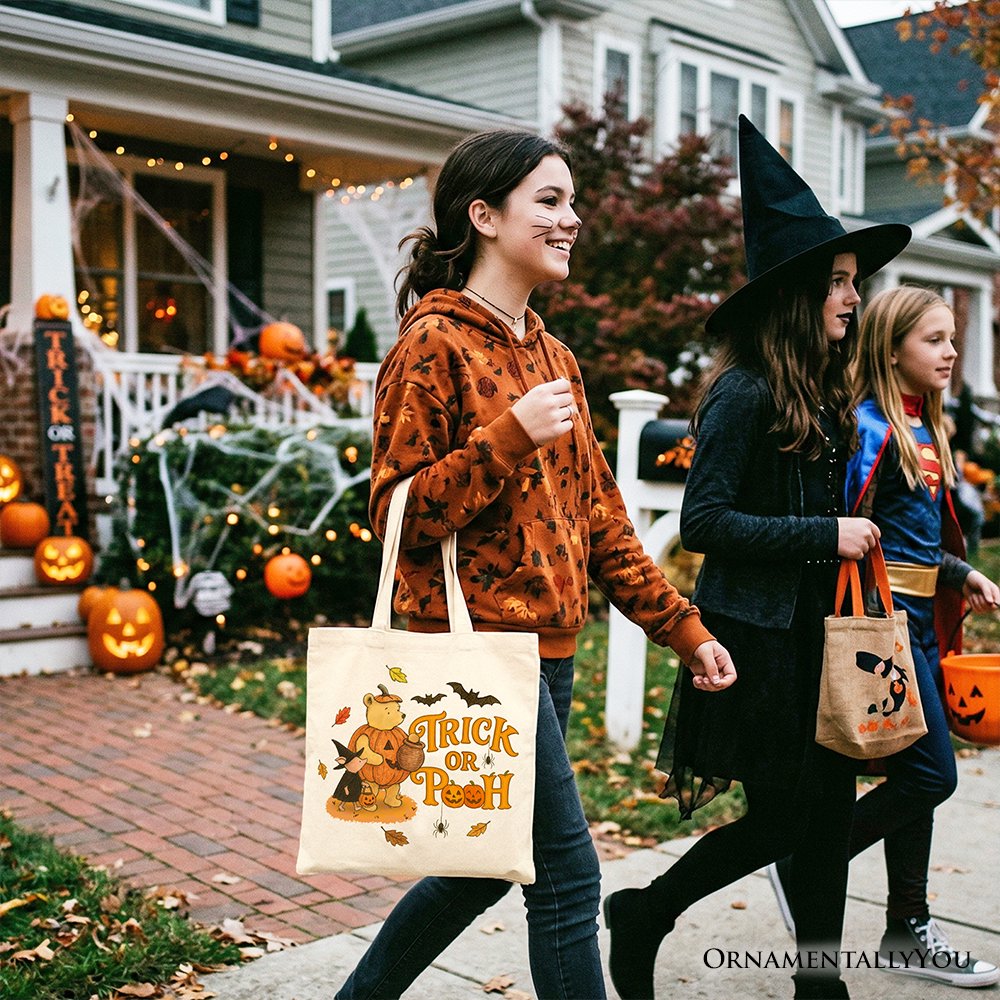 Light-colored Winnie-the-Pooh tote bag with Trick or Treat Pooh front graphic