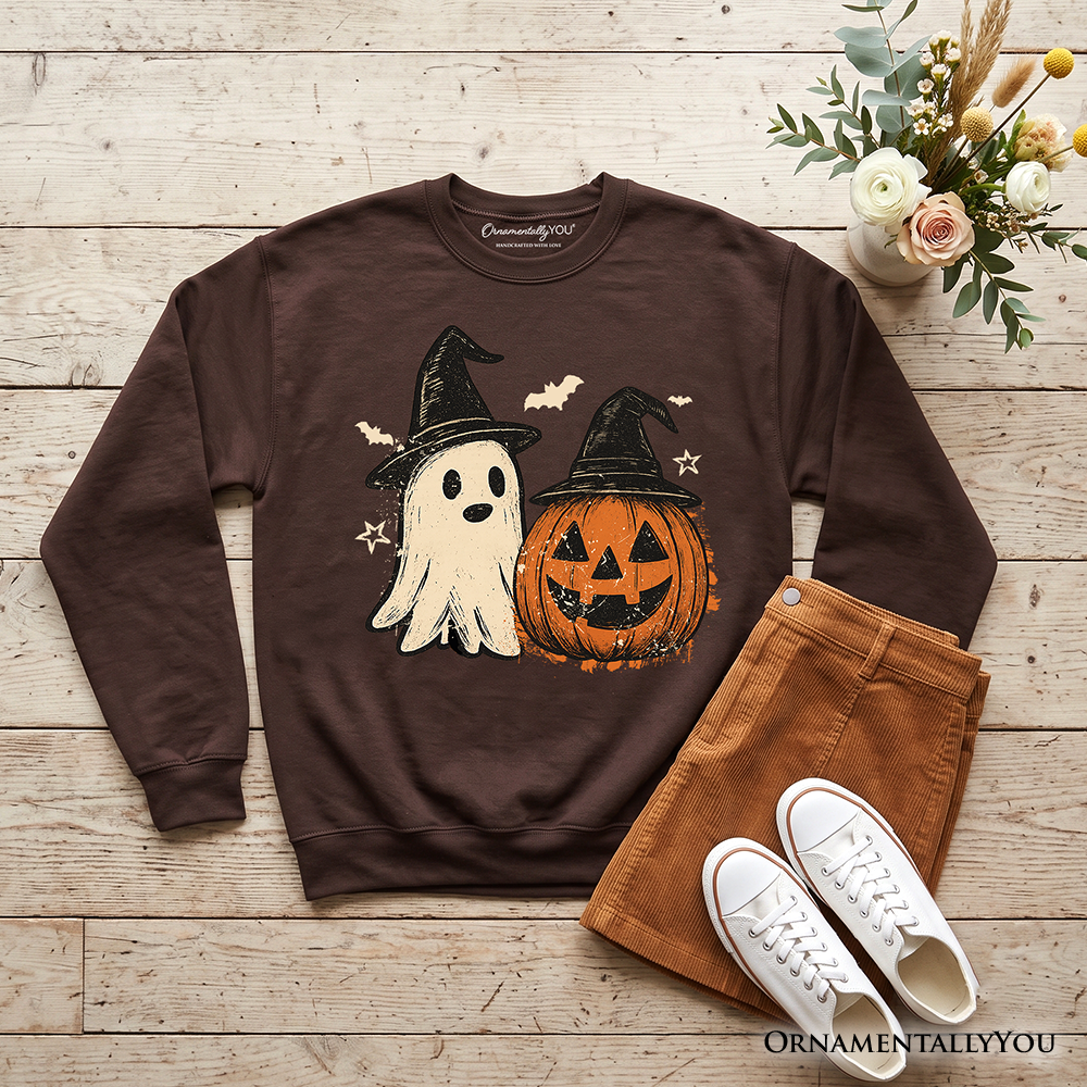 Dark brown sweatshirt with a witch-hat ghost and jack-o'-lantern graphic