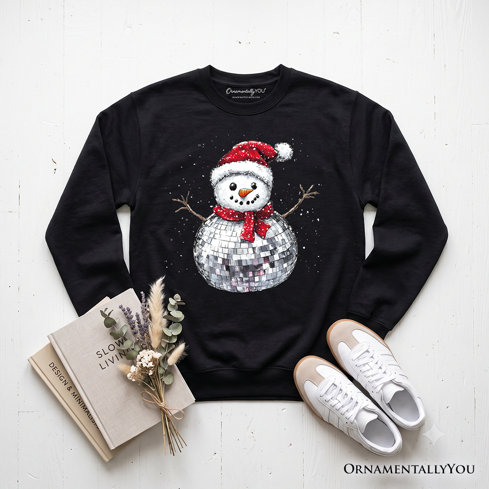 Black sweatshirt laid flat with a disco-ball snowman graphic