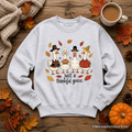 Light gray crewneck sweatshirt laid flat with geese graphic and "just a thankful goose" text