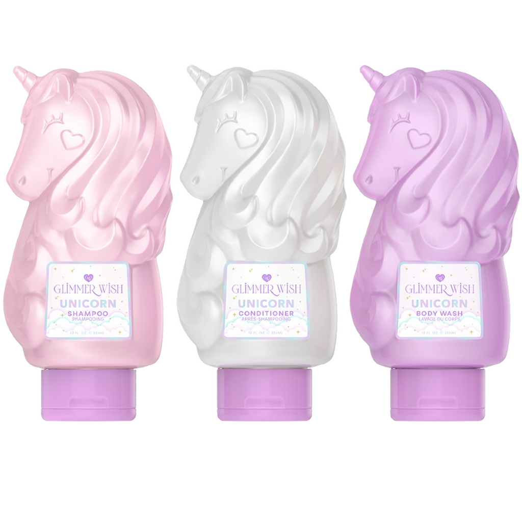 Three unicorn-shaped hair and body bottles in pink, white, and purple
