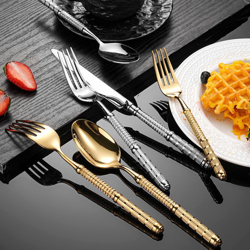 3CARATS embossed flatware set with gold and silver spoons, forks, and knives