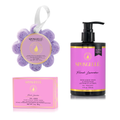Purple flower-shaped pedicure buffer sponge with hanging white ribbon