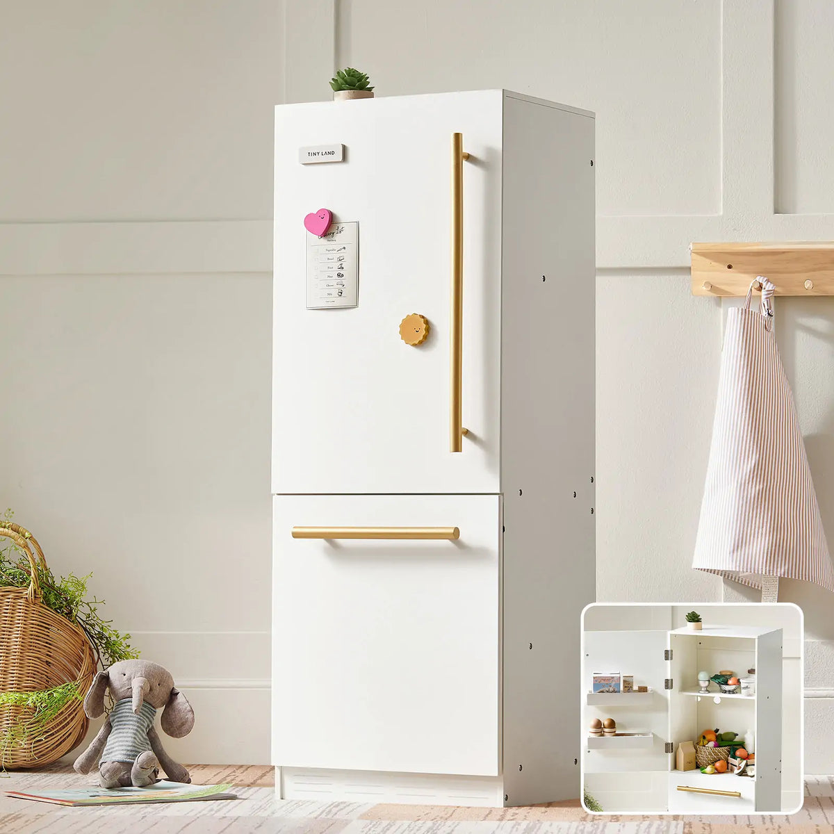 White wooden play kitchen refrigerator cabinet with golden handle and side door panel
