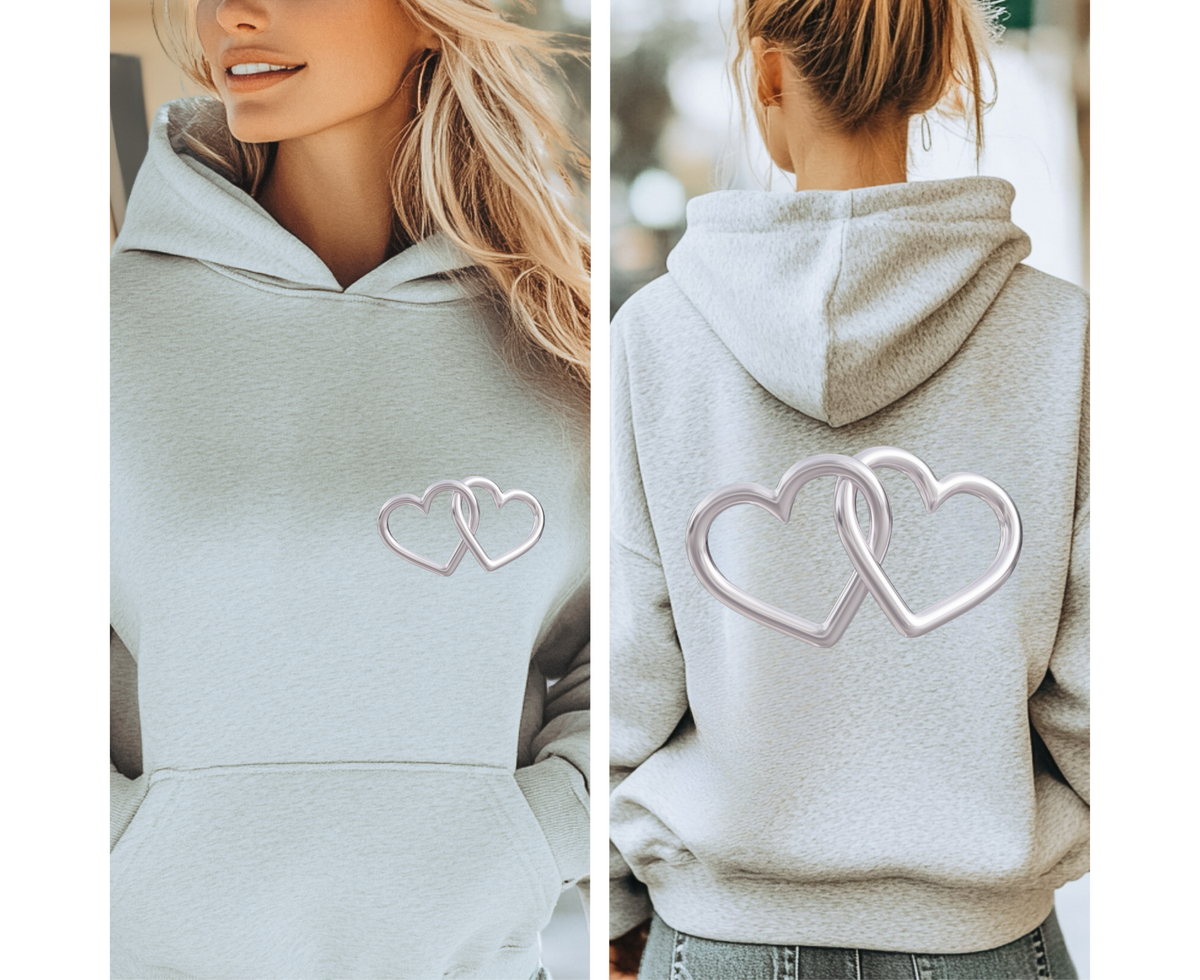 Light gray pullover hoodie with silver interlocking heart graphic on chest
