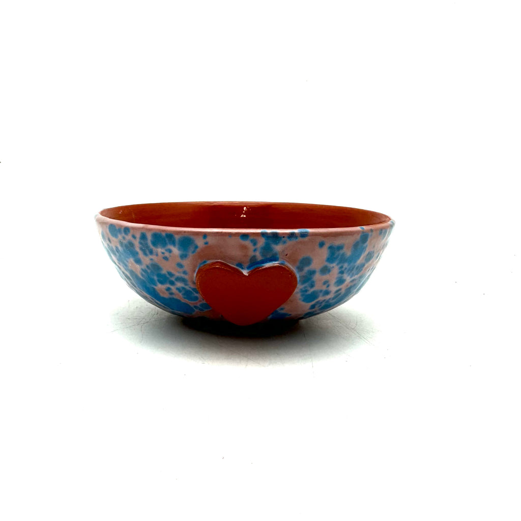 Heart ice-cream bowl with blue speckled exterior, red interior, front red heart emblem
