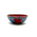 Heart ice-cream bowl with blue speckled exterior, red interior, front red heart emblem