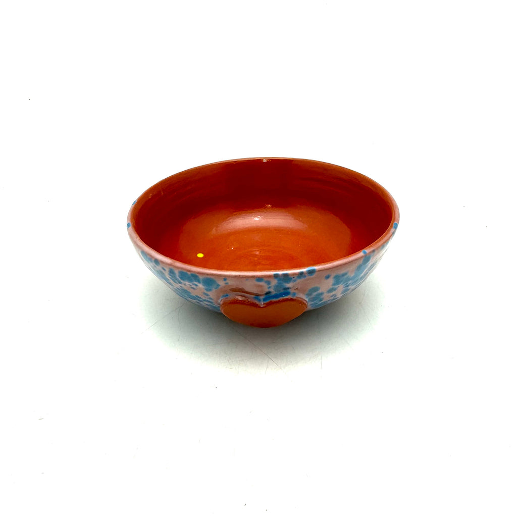 Heart ice-cream bowl with blue speckled sides and red interior, red heart detail front