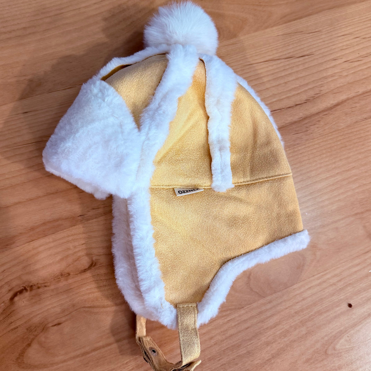 Kids sherpa aviator hat with ear flaps, pale yellow and white fleece trim