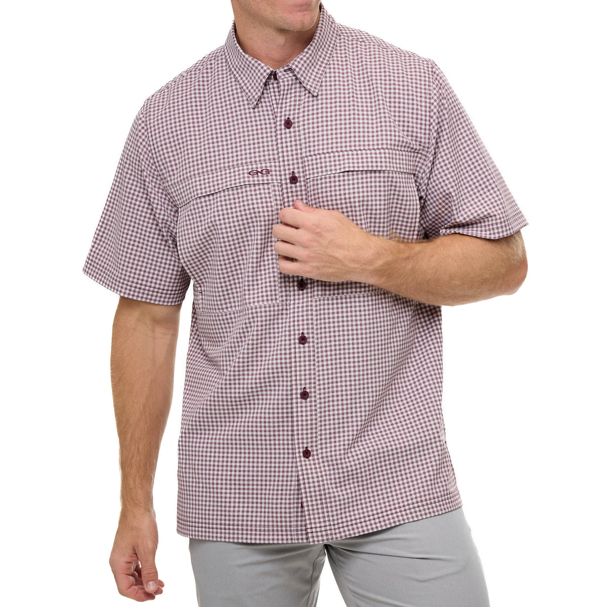 Maroon check short-sleeve button-up shirt with chest pockets and dark buttons.