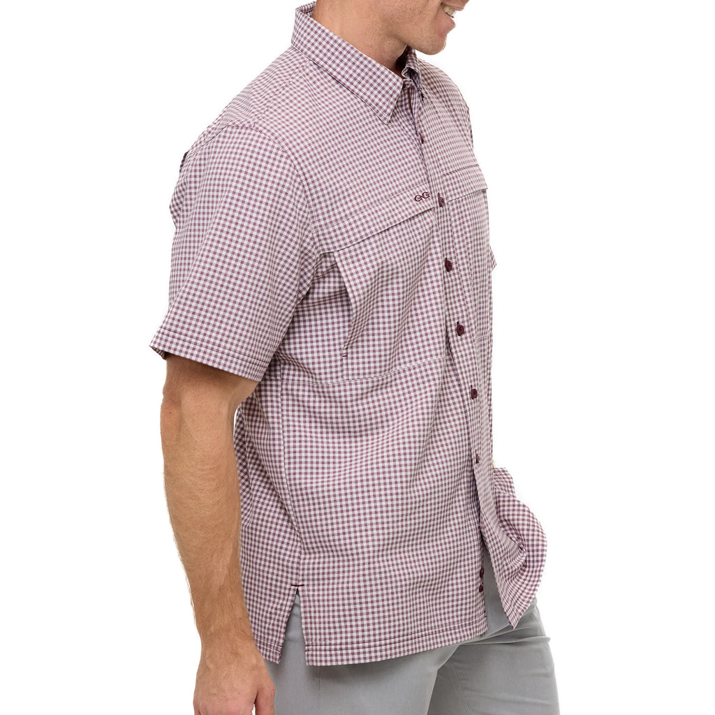 Maroon check short-sleeve button-up shirt with chest pocket and side drape.