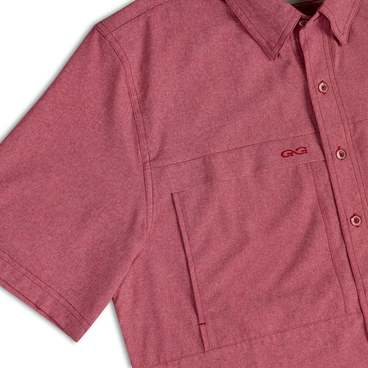 Crimson short-sleeve button-up shirt close-up of chest pocket, buttons, logo