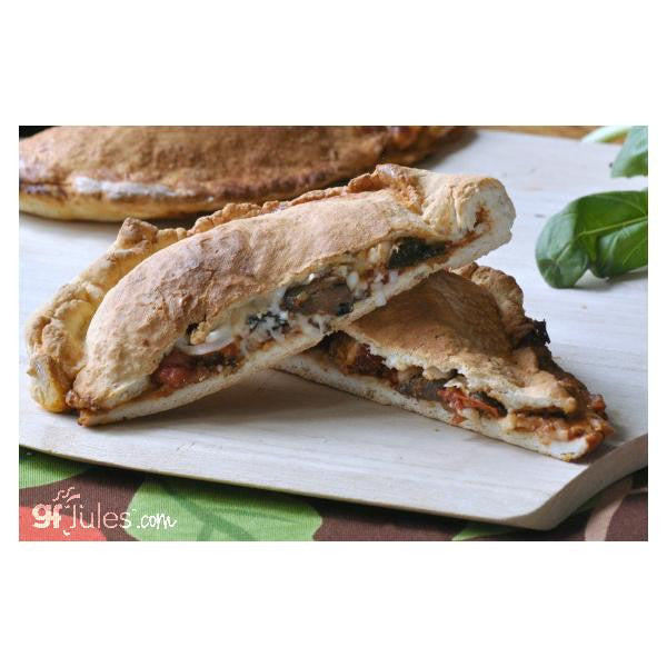 Gluten-free pizza crust sandwiches with visible cheese and tomato filling