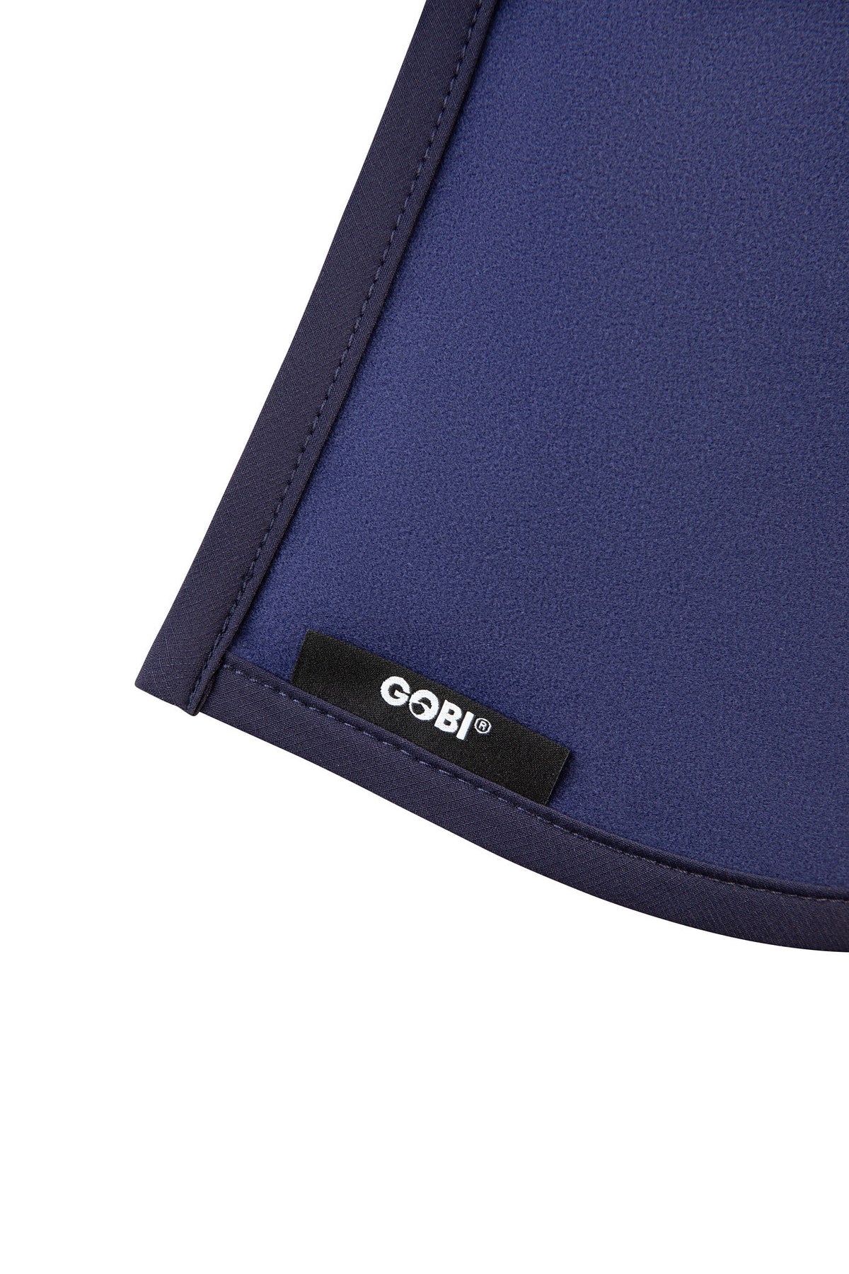 Azure cooling cap branding label on black-edged seam