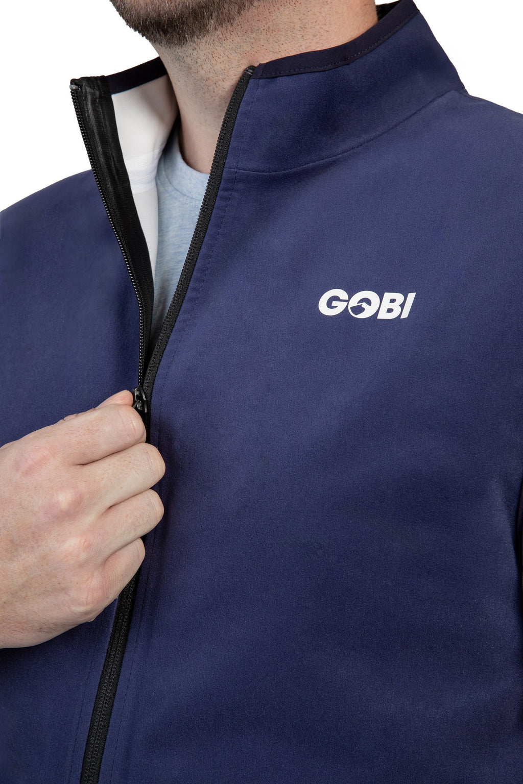 Blue cooling vest with GOBI logo and black zipper front, hand holding