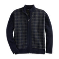 Navy sweater jacket with plaid front, quarter-zip, and ribbed cuffs