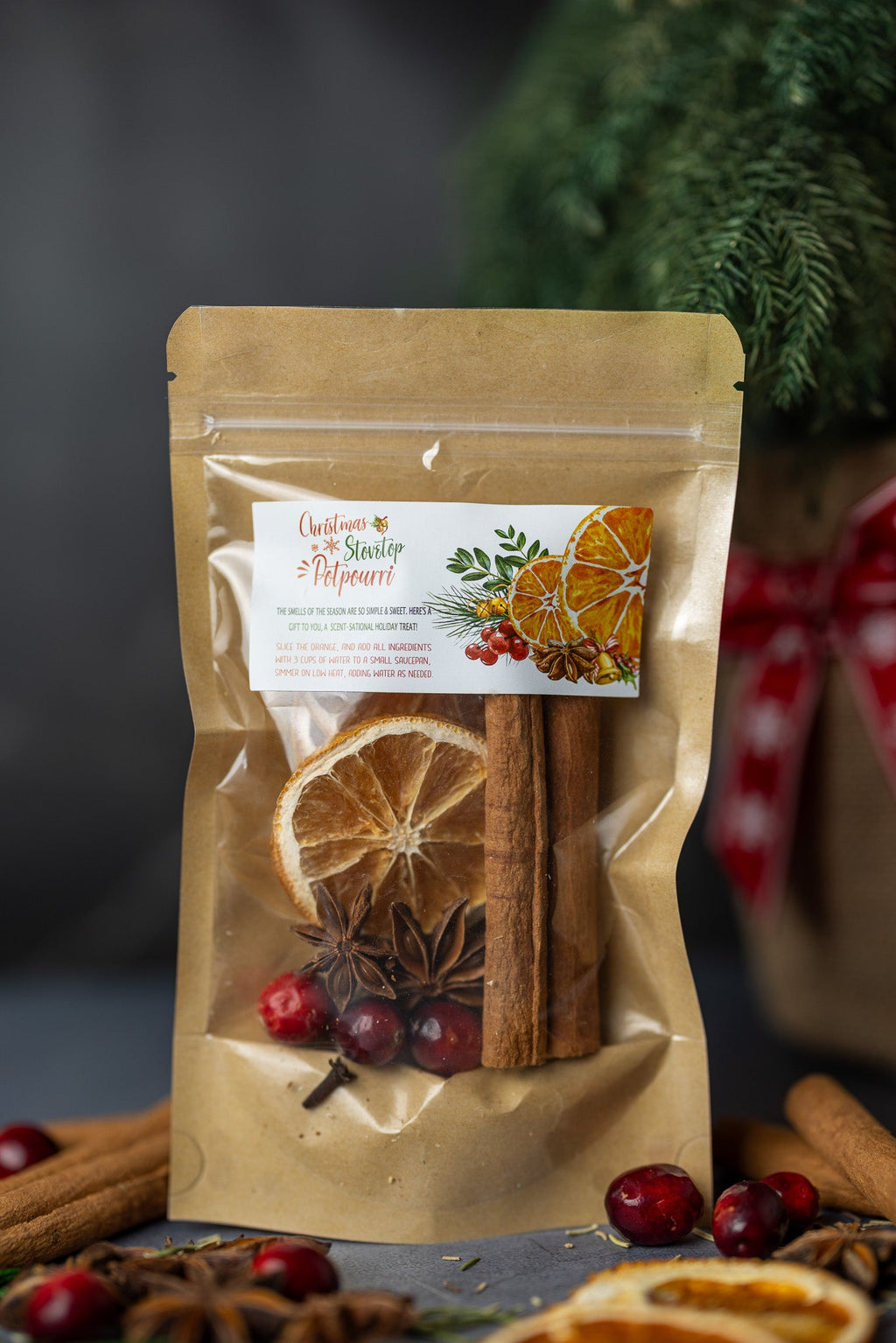 Stovetop potpourri pouch with cinnamon sticks, dried orange, and star anise